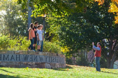 Family photo at Thompson Hall, UNH