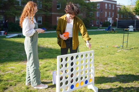 Mills Exterior - Students Playing Lawn Games