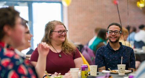 Students eating at a table 